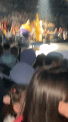Costumed performers captured on stage during Moscow theatrical performance