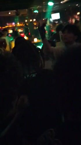 Nightclub scenes captured in Liangjiang, China during evening hours