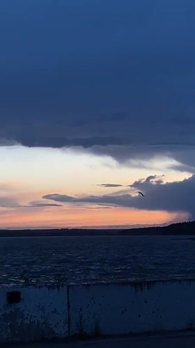 Dusk observed over Votkinsk Reservoir with dramatic sky colors