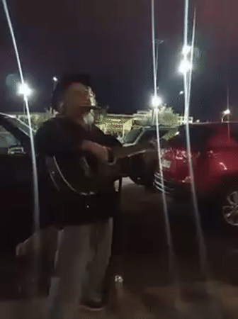 Late-night acoustic set in an Arica parking lot