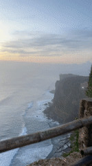 Tourists capture sunset views from Kuta Selatan clifftop