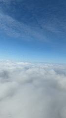 Passenger documents aerial views during flight over Russian countryside