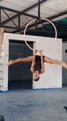 Woman performs aerial hoop acrobatics in Porlamar, Venezuela