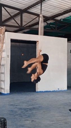 Woman performs aerial hoop acrobatics in Porlamar, Venezuela