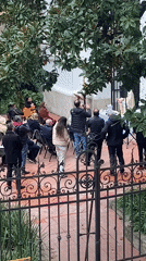 Small outdoor gathering draws dozens to Buenos Aires courtyard
