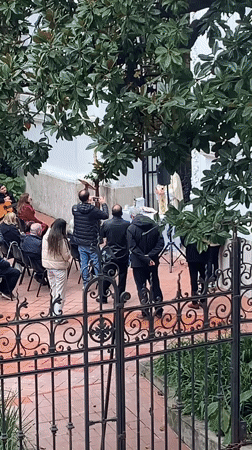 Small outdoor gathering draws dozens to Buenos Aires courtyard