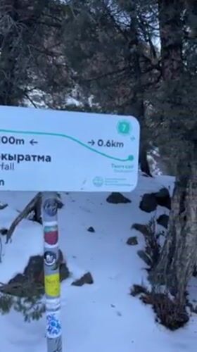 Winter hikers traverse frozen terrain in Kyrgyzstan mountains