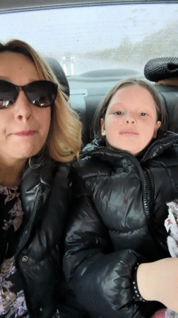 Woman records video with passengers in Krasnaya Gorka vehicle