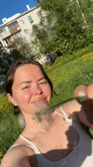 Woman conducts early morning dandelion photo session in Izhevsk