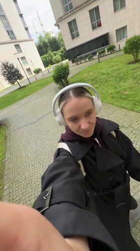Woman documents walk through Esenyurt with selfie videos