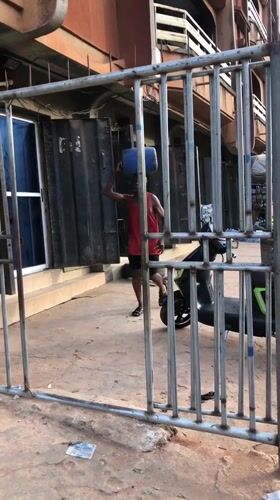 Afternoon market life documented in Onitsha, Nigeria commercial district