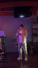 Musical duo performs at Montenegro bar under colored lights