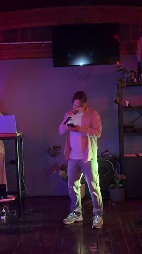 Musical duo performs at Montenegro bar under colored lights