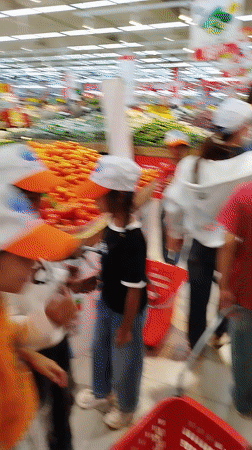 Busy morning shopping scene captured at Da Lat supermarket