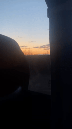 Sunset observed from vehicle in Kozulka, Russia