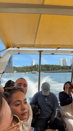 Group Takes Boat Trip on Sunny Day in Pattaya