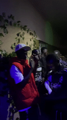 Young men gather for evening party in Nigerian community