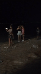 Evening hangout on a pebble beach in Sutomore, Montenegro