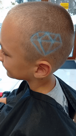 Geometric hair stencil detail at a Shumen barbershop