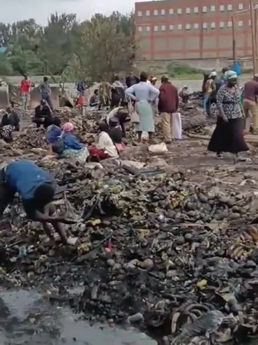 Fire aftermath and debris cleanup in a Nairobi neighborhood