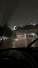 Heavy rain creates challenging nighttime driving conditions in Puebla