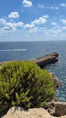 Coastal scenes documented in Għajnsielem Malta during sunny afternoon