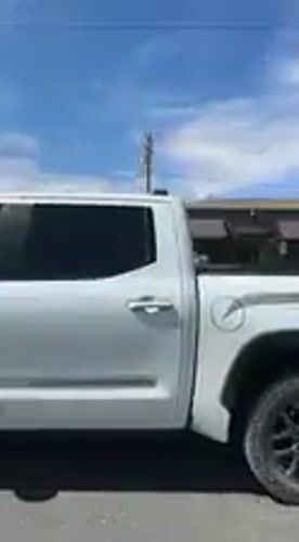 White pickup truck filmed in Yucca Valley evening