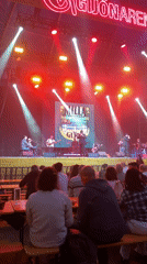 Rock band performs outdoor concert in Gijón, Spain