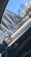 Driver travels through Valencia past Arts Sciences complex