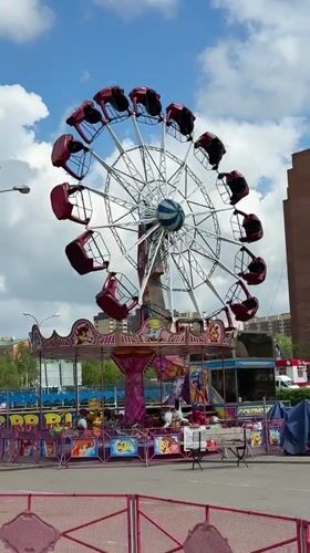 Carnival rides operating in Dmitrov, Russia on sunny day