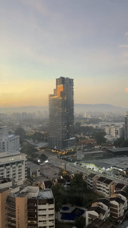 Kuala Lumpur skyline at twilight, multiple aerial perspectives
