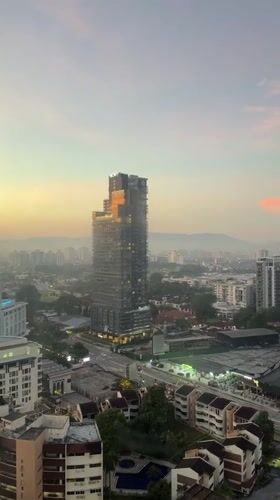 Kuala Lumpur skyline at twilight, multiple aerial perspectives