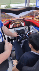 Racing simulator and stunt cycling event documented in Dushanbe