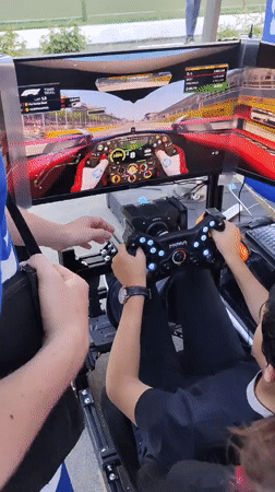 Racing simulator and stunt cycling event documented in Dushanbe