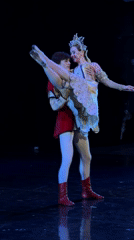 Ballet performance on a dark Ufa stage, ornate costumes throughout