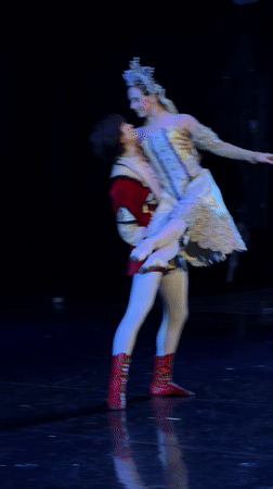 Ballet performance on a dark Ufa stage, ornate costumes throughout