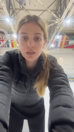 Women ice skating, filming videos at Tbilisi indoor rink