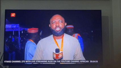 News reporter broadcasts from Gwarinpa, Nigeria with ALT microphone