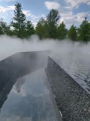 Visitors enjoy tiered waterfalls and mist fountains at Krasnodar park