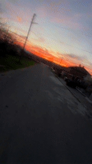 Sunset walk captured on rural Bulgarian road