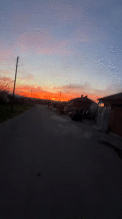 Sunset walk captured on rural Bulgarian road