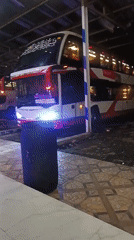 Night stop at Cikawung bus station, HT Trans double-decker.