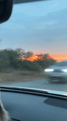 Sunset drive captured on rural Morocco road near Ghmate
