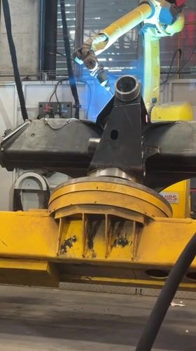 Robotic and manual metalwork underway at a Bulgarian industrial facility