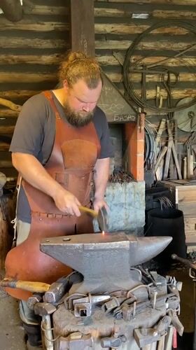 Kizhi Island: wooden church and blacksmith at work