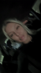 Woman filmed in dimly lit car in Bulgarian village