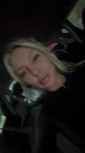 Woman filmed in dimly lit car in Bulgarian village