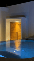Illuminated pools captured at night in Baan Tai, Thailand