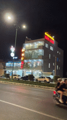 Nighttime street scene recorded at Vietnamese seafood restaurant