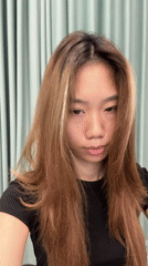 Woman takes selfies in Nan'an District early morning